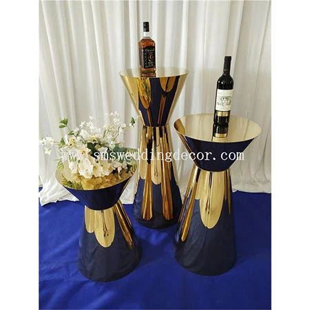 round gold pedestal table